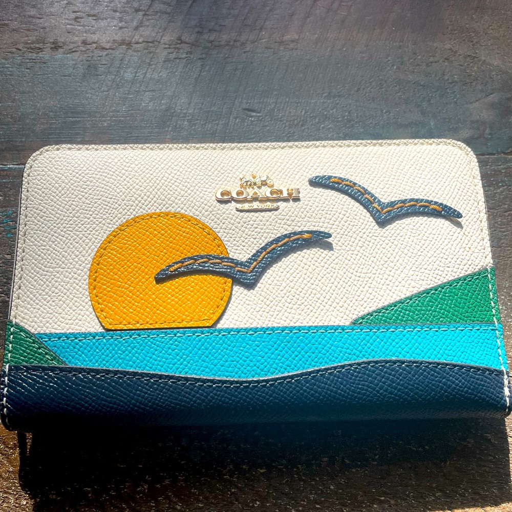 Coach zip around wallet sunset motif